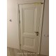 Фото дверей Имидж Новый Стиль магнолия глухое с фигурным наличником в интерьере